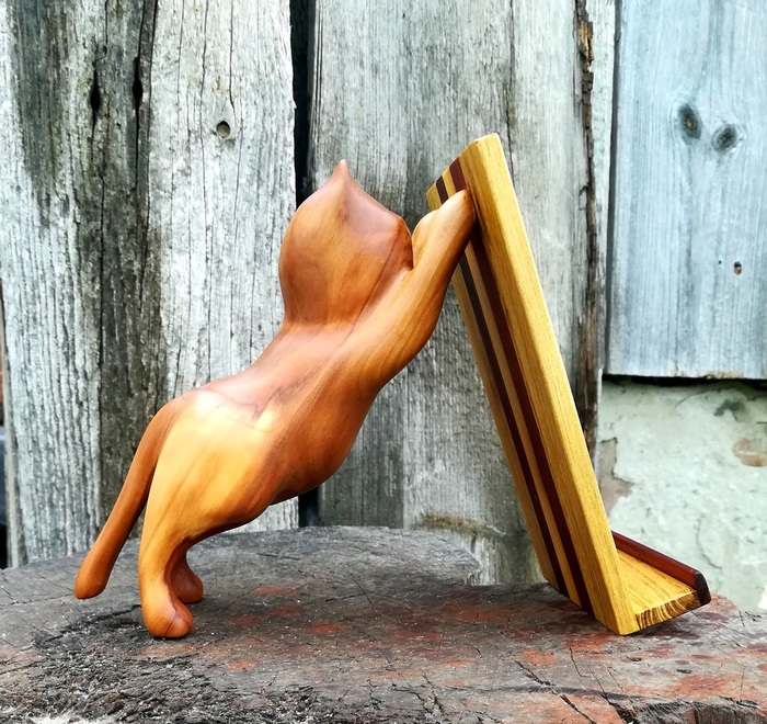 Подделка кошки из дерева